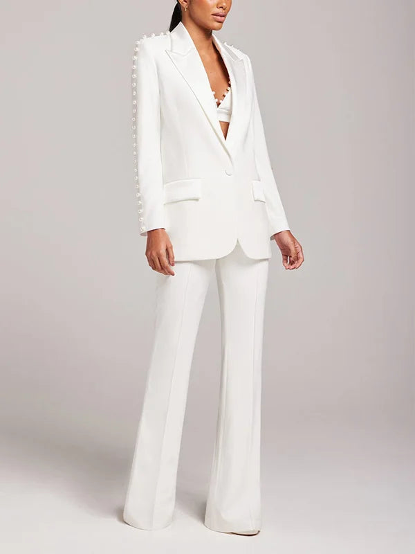 Nine White Trousers